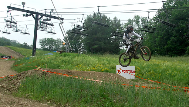 Joe Shack, race run, boosting the lip.